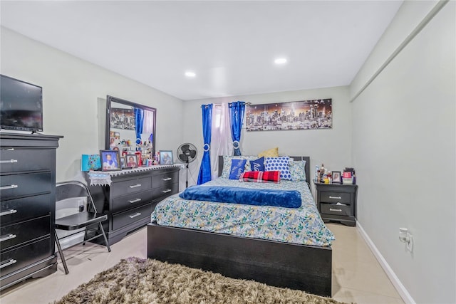 bedroom with recessed lighting, baseboards, and light tile patterned floors