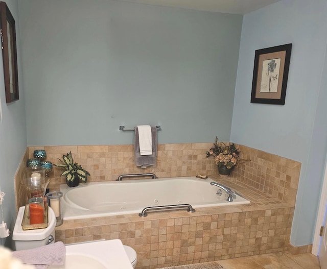 full bathroom with a garden tub and toilet