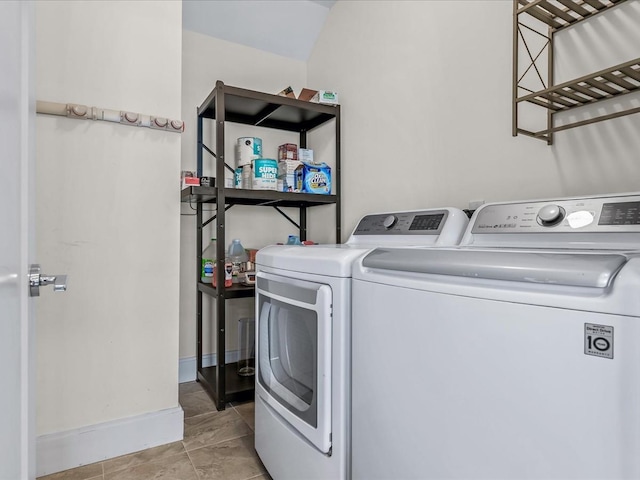 141 Marina Pointe Dr, East Rockaway, NY 11518 - clothes washing area with laundry area, baseboards, and washing machine and clothes dryer