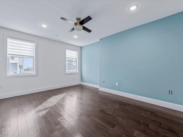 141 Marina Pointe Dr, East Rockaway, NY 11518 - unfurnished room featuring dark wood-style floors, recessed lighting, ceiling fan, and baseboards