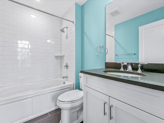 141 Marina Pointe Dr, East Rockaway, NY 11518 - full bath featuring visible vents, shower / bath combination, vanity, and toilet