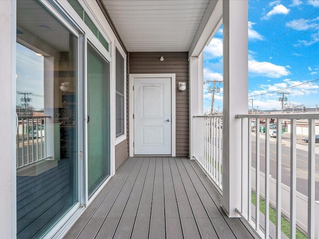 141 Marina Pointe Dr, East Rockaway, NY 11518 - balcony featuring a sunroom