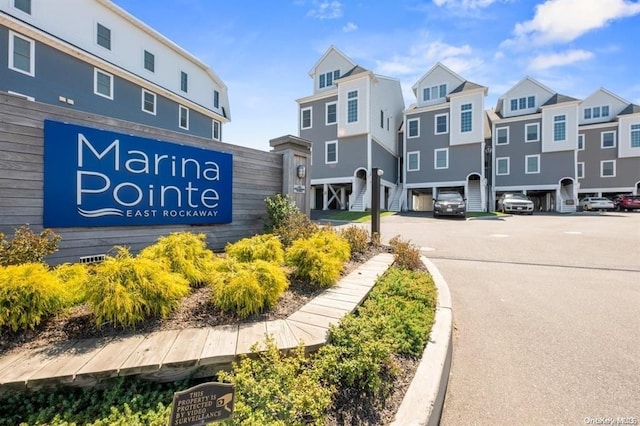141 Marina Pointe Dr, East Rockaway, NY 11518 - exterior space featuring curbs and a residential view