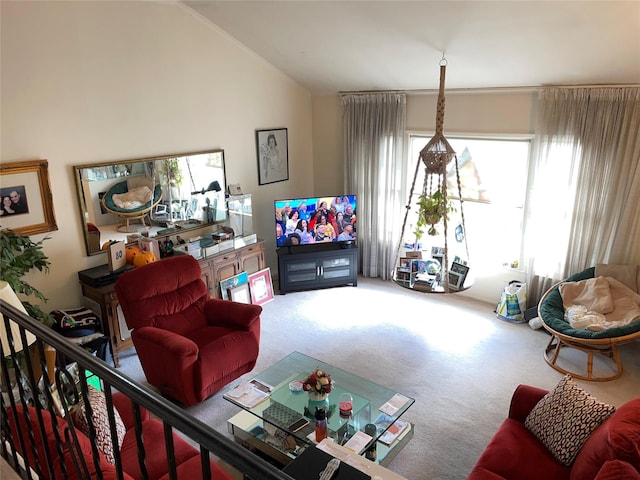 carpeted living room featuring vaulted ceiling