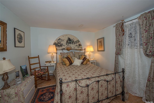 bedroom with tile patterned flooring