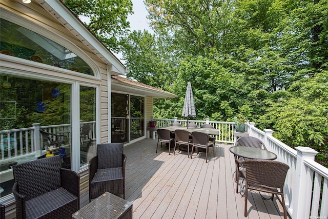 deck featuring outdoor dining space