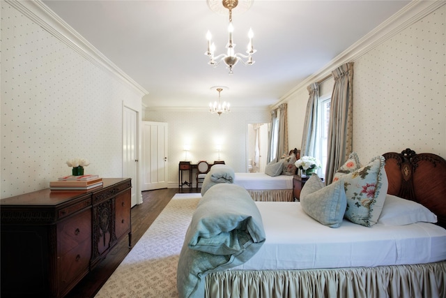 bedroom featuring crown molding, an inviting chandelier, dark wood-style floors, and wallpapered walls