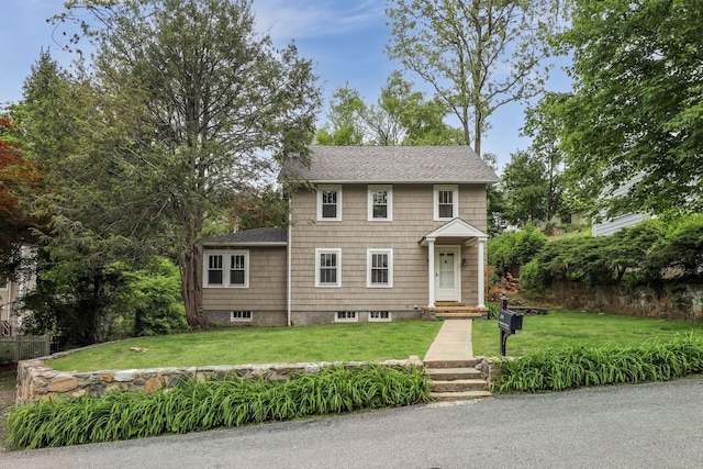 26 Annadale St, Armonk, NY 10504 - view of front of property featuring a front lawn and a shingled roof