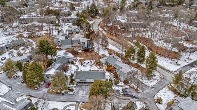 snowy aerial view with a residential view