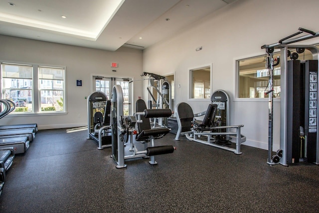 gym featuring recessed lighting and baseboards