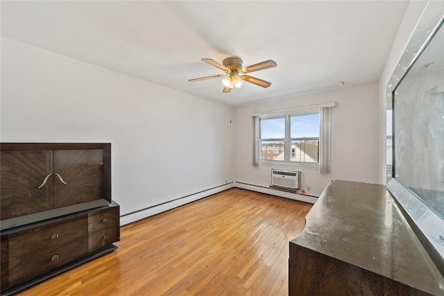 unfurnished living room with a baseboard radiator, a baseboard heating unit, a ceiling fan, light wood finished floors, and a wall mounted air conditioner