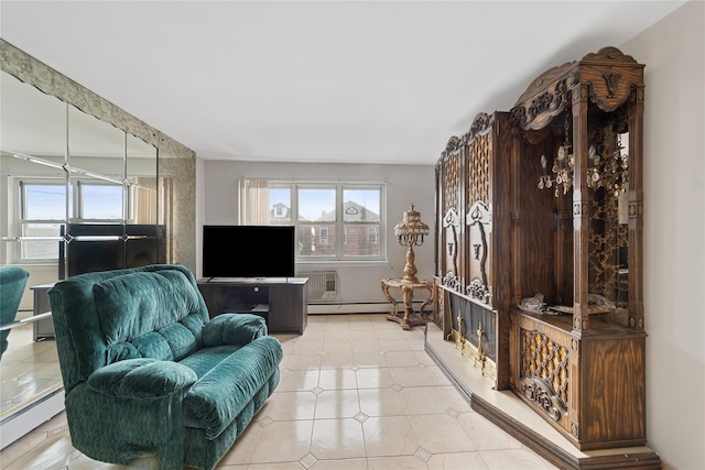 living room featuring a baseboard heating unit and plenty of natural light