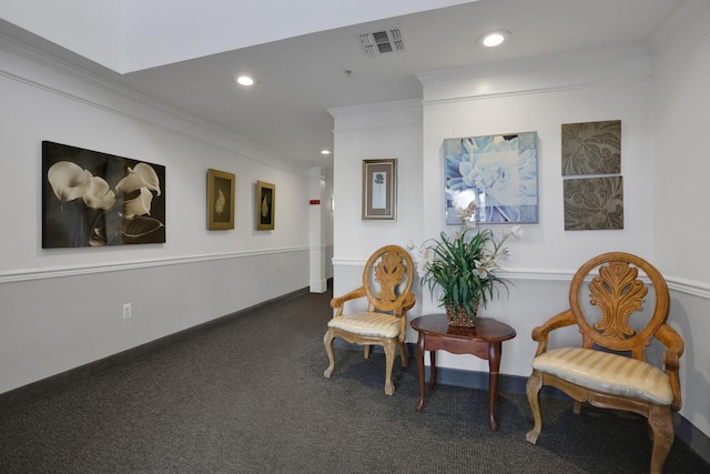 living area featuring crown molding, recessed lighting, visible vents, carpet flooring, and baseboards