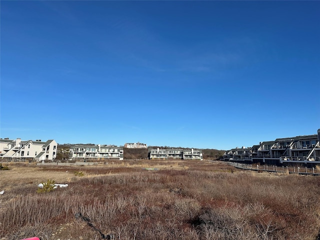 view of yard featuring a residential view