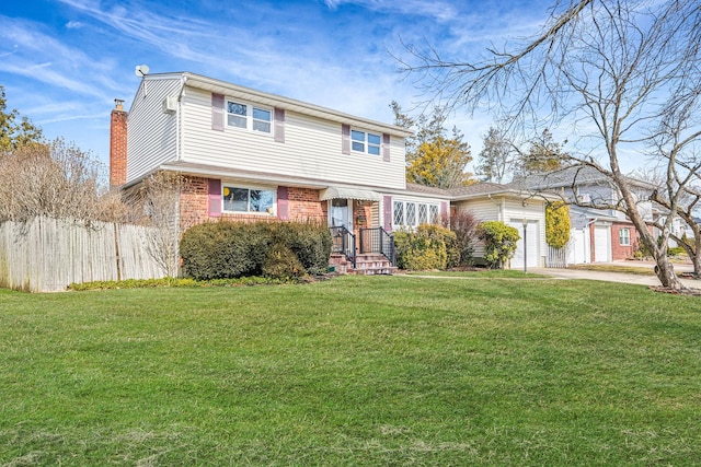 view of front of home featuring driveway, an attached garage, fence, a front lawn, and brick siding