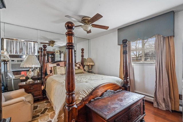 bedroom with wood finished floors