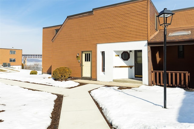 exterior space with stucco siding