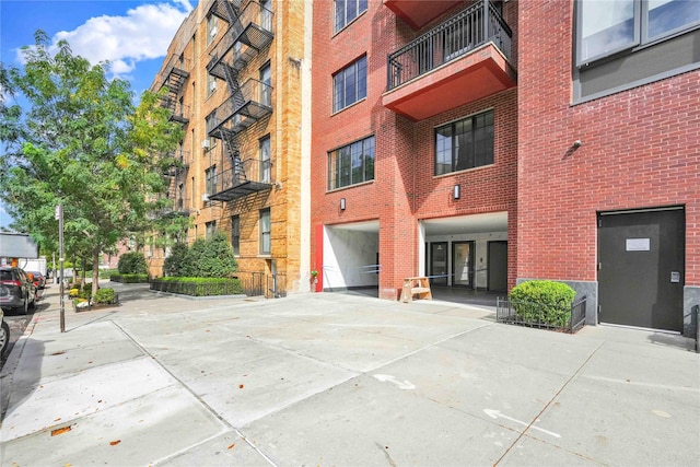 view of property featuring driveway and an attached garage