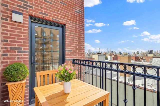 balcony featuring a view of city