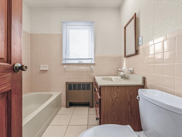 bathroom with toilet, radiator heating unit, tile walls, and tile patterned floors