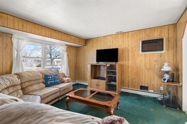 living area featuring visible vents, a baseboard heating unit, dark carpet, and a wall mounted AC