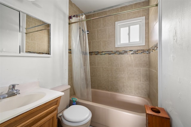 full bath featuring shower / bath combination with curtain, vanity, and toilet