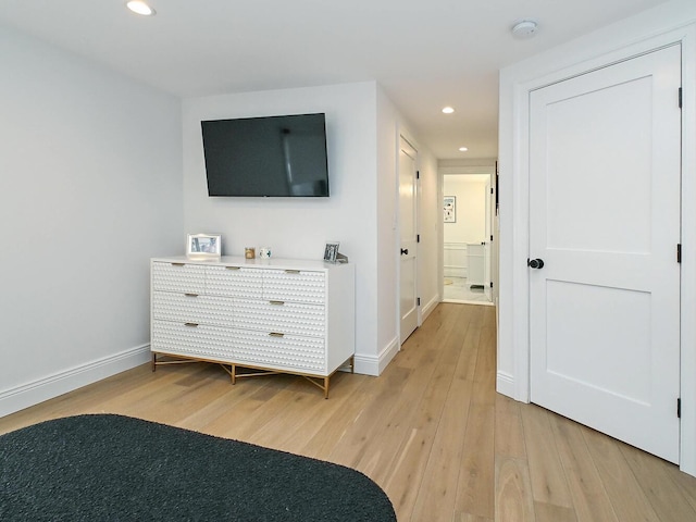 bedroom with recessed lighting, baseboards, and light wood finished floors