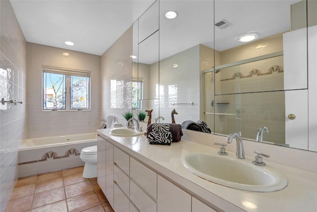 full bathroom with toilet, visible vents, a sink, and a shower with shower door