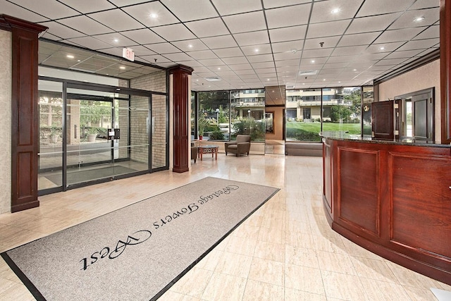 welcome area featuring decorative columns