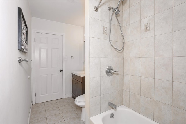 full bath with toilet, washtub / shower combination, vanity, and tile patterned floors