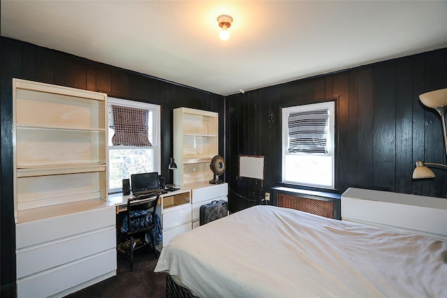 bedroom featuring radiator