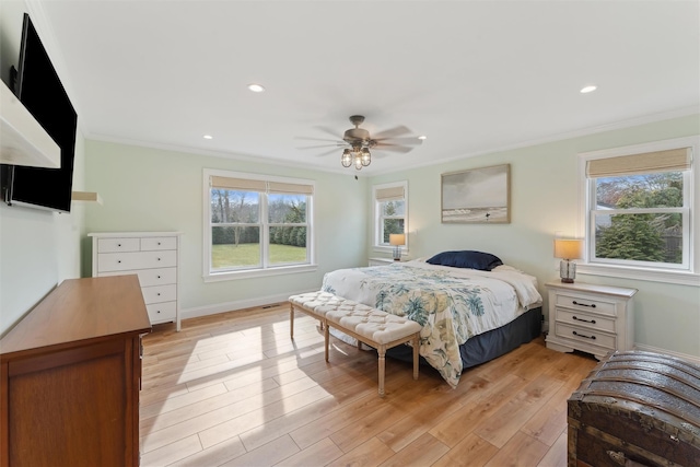 bedroom featuring light wood finished floors, baseboards, ornamental molding, and recessed lighting