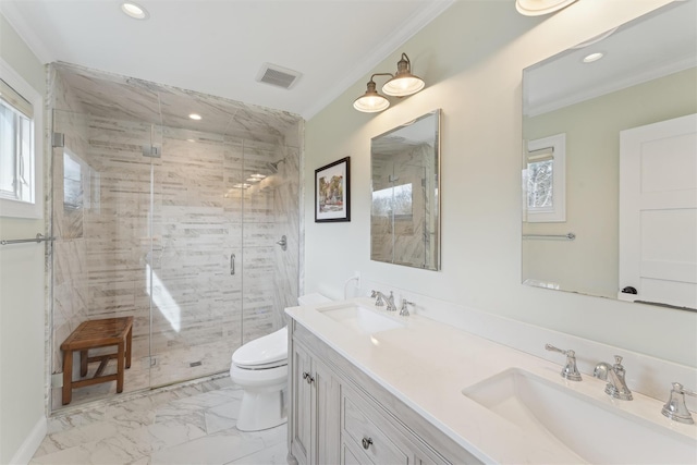 bathroom featuring marble finish floor, visible vents, a sink, and ornamental molding