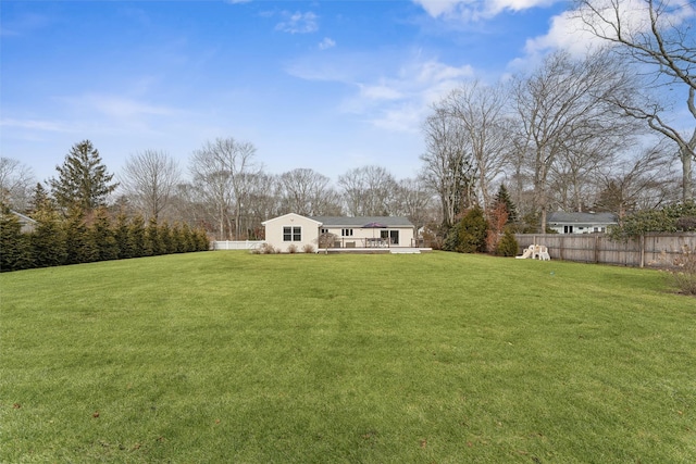 view of yard with fence