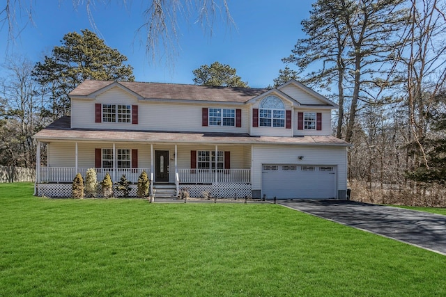 view of front facade featuring a garage, covered porch, driveway, and a front lawn