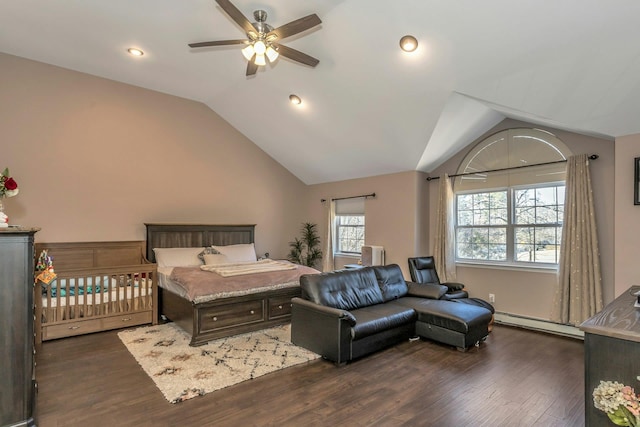 bedroom with a baseboard heating unit, vaulted ceiling, dark wood-type flooring, and recessed lighting