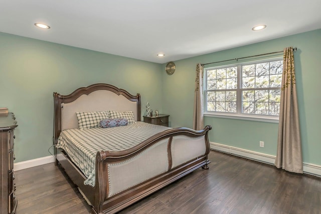 bedroom with baseboards, dark wood finished floors, and recessed lighting