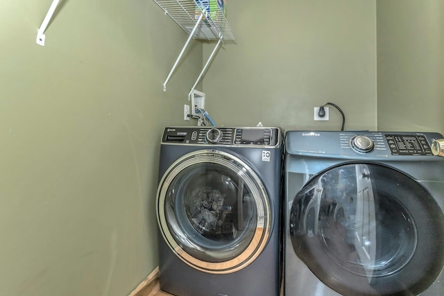 laundry room with laundry area and washer and dryer