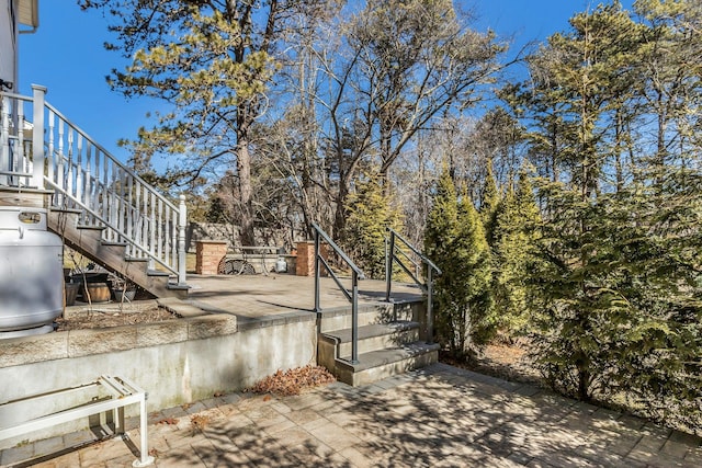 exterior space with driveway and stairway