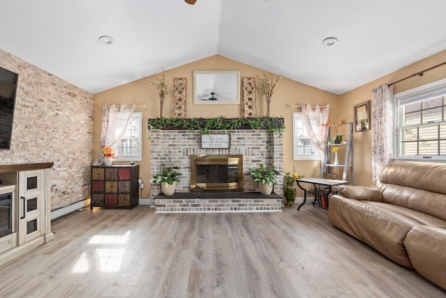 unfurnished living room with a fireplace, a baseboard radiator, vaulted ceiling, wood finished floors, and baseboards