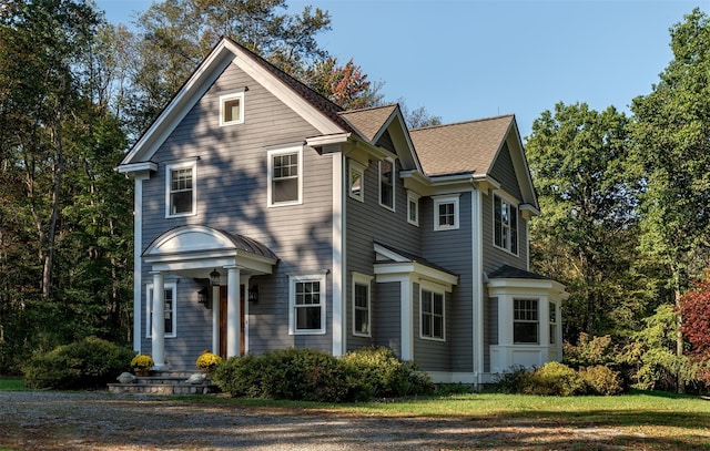 view of front facade featuring a shingled roof