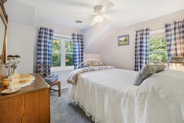 bedroom with visible vents, a ceiling fan, and carpet floors