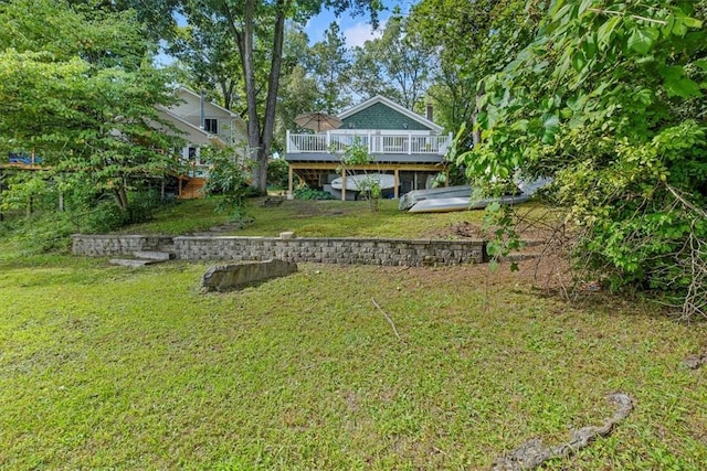 view of yard featuring a wooden deck