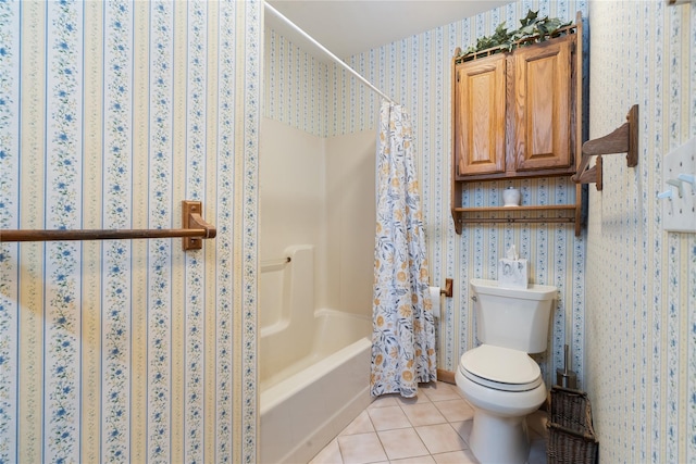 bathroom featuring tile patterned flooring, shower / bathtub combination with curtain, toilet, and wallpapered walls