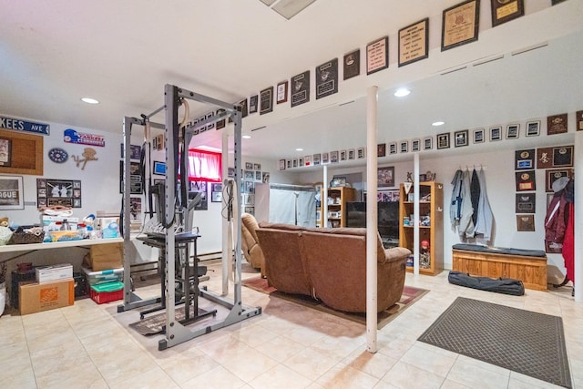 workout room with tile patterned flooring and recessed lighting