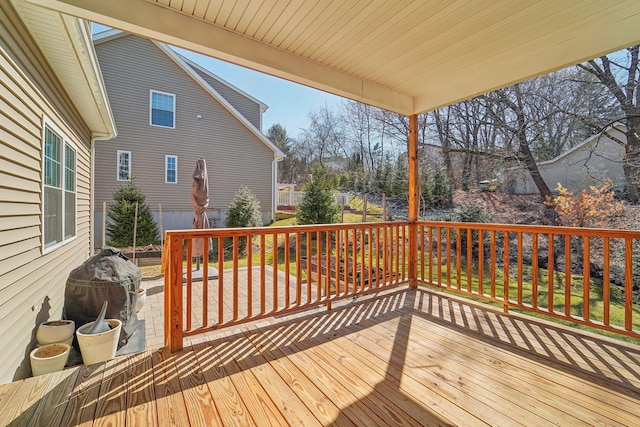 wooden deck with area for grilling