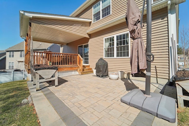 view of patio / terrace with fence and a wooden deck