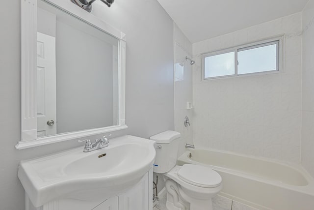 full bathroom featuring tile patterned flooring, tub / shower combination, vanity, and toilet