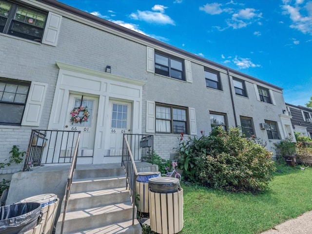 multi unit property featuring brick siding