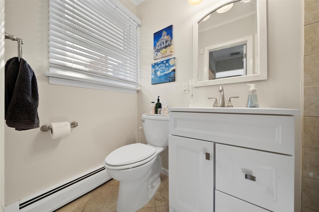 bathroom with tile patterned floors, toilet, vanity, and a baseboard radiator